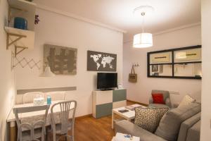 Telewizja i/lub zestaw kina domowego w obiekcie Apartamento Vive en Maravillas