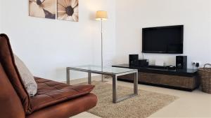 Μια τηλεόραση ή/και κέντρο ψυχαγωγίας στο Casa La Vista - Bungalow with fantastic sea views