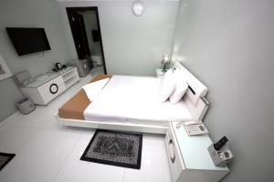 Kuchyň nebo kuchyňský kout v ubytování White Fort Hotel