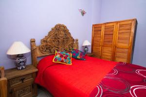 Postel nebo postele na pokoji v ubytování Posada Maria Luisa
