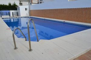 The swimming pool at or close to Apacos muy cerca playa Entrada Autónoma