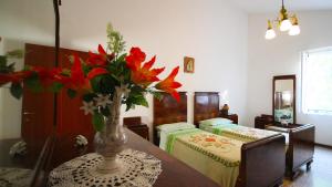 A bed or beds in a room at Country House Daniela