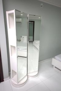 Postel nebo postele na pokoji v ubytování White Fort Hotel