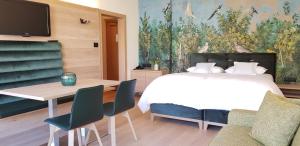 Postel nebo postele na pokoji v ubytování Hotel Gartenresidence Zea Curtis