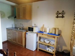 A cozinha ou kitchenette de Meimoa Guesthouse