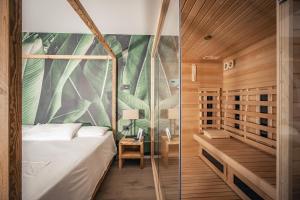 Postel nebo postele na pokoji v ubytování Hotel San Giacomo Spa&Gourmet + 37 fotografií