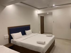 Postel nebo postele na pokoji v ubytování JN Guestline