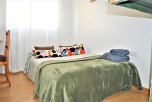A bed or beds in a room at KHORS