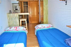 A bed or beds in a room at KHORS