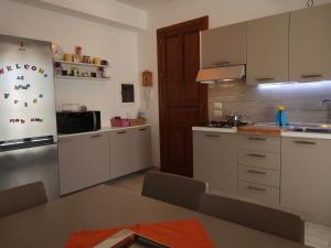 Η κουζίνα ή μικρή κουζίνα στο Casa Frida +7 φωτογραφίες