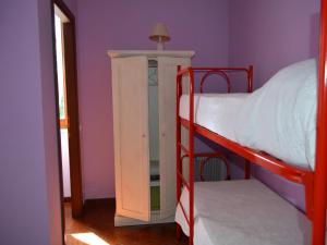 a bedroom with two bunk beds and a window at Il Giardino di Venere in Terni