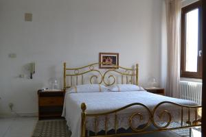 Postel nebo postele na pokoji v ubytování Hotel Moderno