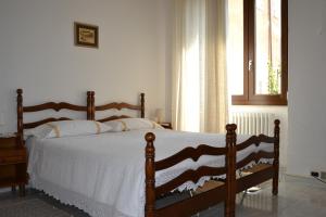 Postel nebo postele na pokoji v ubytování Hotel Moderno