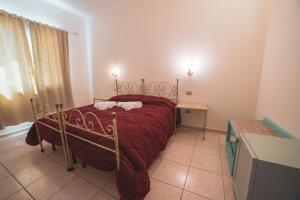 Postel nebo postele na pokoji v ubytování Villa Alberta Hotel