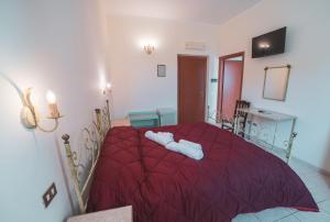 Postel nebo postele na pokoji v ubytování Villa Alberta Hotel