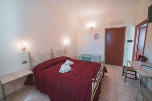 TV a/nebo společenská místnost v ubytování Villa Alberta Hotel
