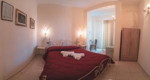 Postel nebo postele na pokoji v ubytování Villa Alberta Hotel