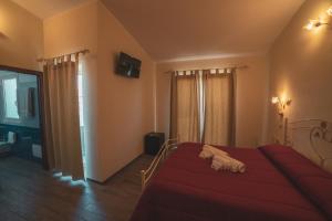 Postel nebo postele na pokoji v ubytování Villa Alberta Hotel