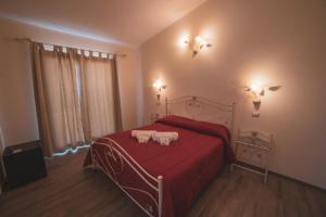 Postel nebo postele na pokoji v ubytování Villa Alberta Hotel