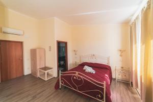 Postel nebo postele na pokoji v ubytování Villa Alberta Hotel
