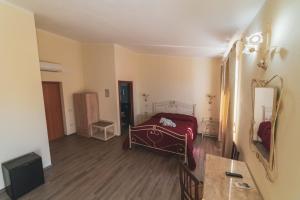 TV a/nebo společenská místnost v ubytování Villa Alberta Hotel