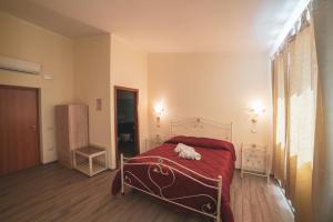 Postel nebo postele na pokoji v ubytování Villa Alberta Hotel
