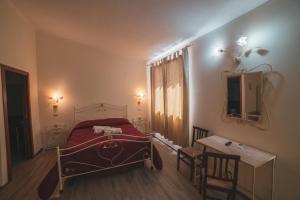 Postel nebo postele na pokoji v ubytování Villa Alberta Hotel