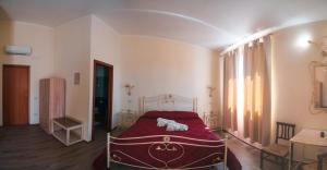 Postel nebo postele na pokoji v ubytování Villa Alberta Hotel