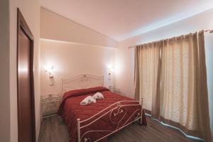 Postel nebo postele na pokoji v ubytování Villa Alberta Hotel