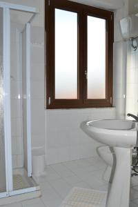 Koupelna v ubytování Hotel Moderno