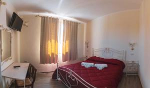 Postel nebo postele na pokoji v ubytování Villa Alberta Hotel