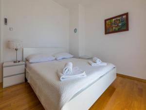 Postel nebo postele na pokoji v ubytování Villa CARPE DIEM