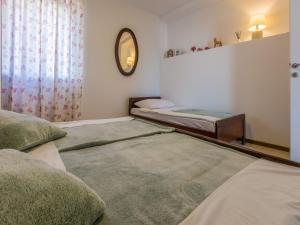 Posteľ alebo postele v izbe v ubytovaní Apartment Slavka