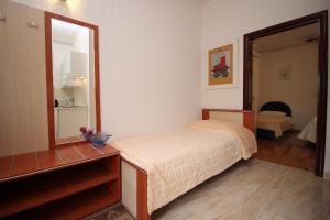 Posteľ alebo postele v izbe v ubytovaní Apartments IVONA 2