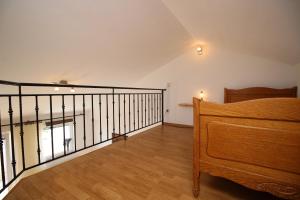 Posteľ alebo postele v izbe v ubytovaní Apartments IVONA 6