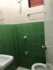 Koupelna v ubytování Edem Tourist Inn Malapascua