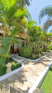 Zahrada ubytování Samba Villas Beachfront View