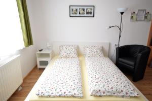 Postel nebo postele na pokoji v ubytování Toldi Apartments Pécs