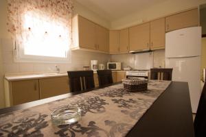 Kuchyň nebo kuchyňský kout v ubytování Stasa Luxury Apartments