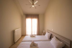 Postel nebo postele na pokoji v ubytování Stasa Luxury Apartments