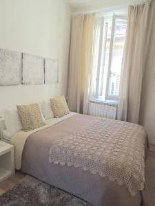 Postel nebo postele na pokoji v ubytování Casa nei pressi del Duomo,Firenze centro storico