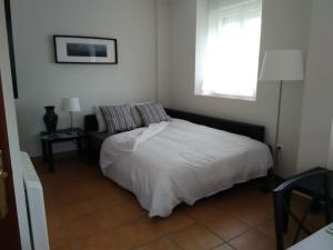 Postel nebo postele na pokoji v ubytování El Chalet Rosso