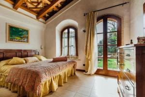 Postel nebo postele na pokoji v ubytování Casa Conti di Sotto + 37 fotografií