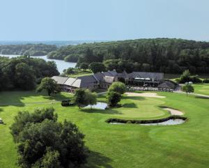 an aerial view of the golf course at a resort at Saint Malo Golf Resort in Le Tronchet