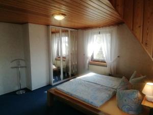 Postel nebo postele na pokoji v ubytování Apartments Achterblick