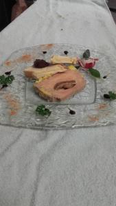 a sandwich on a plate on a table at Logis Hôtel Restaurant de la Dore in Vertolaye +37 photos