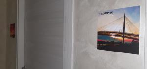 a picture of a bridge hanging on a wall at La Dimora di Maja in Pescara +41 photos