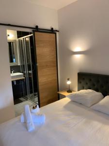 Letto o letti in una camera di Hotel Savel
