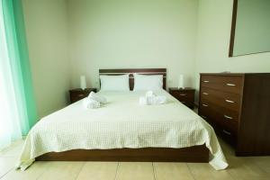 Postel nebo postele na pokoji v ubytování Stasa Luxury Apartments