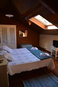 A bed or beds in a room at Núcleo de turismo Rural La Corte